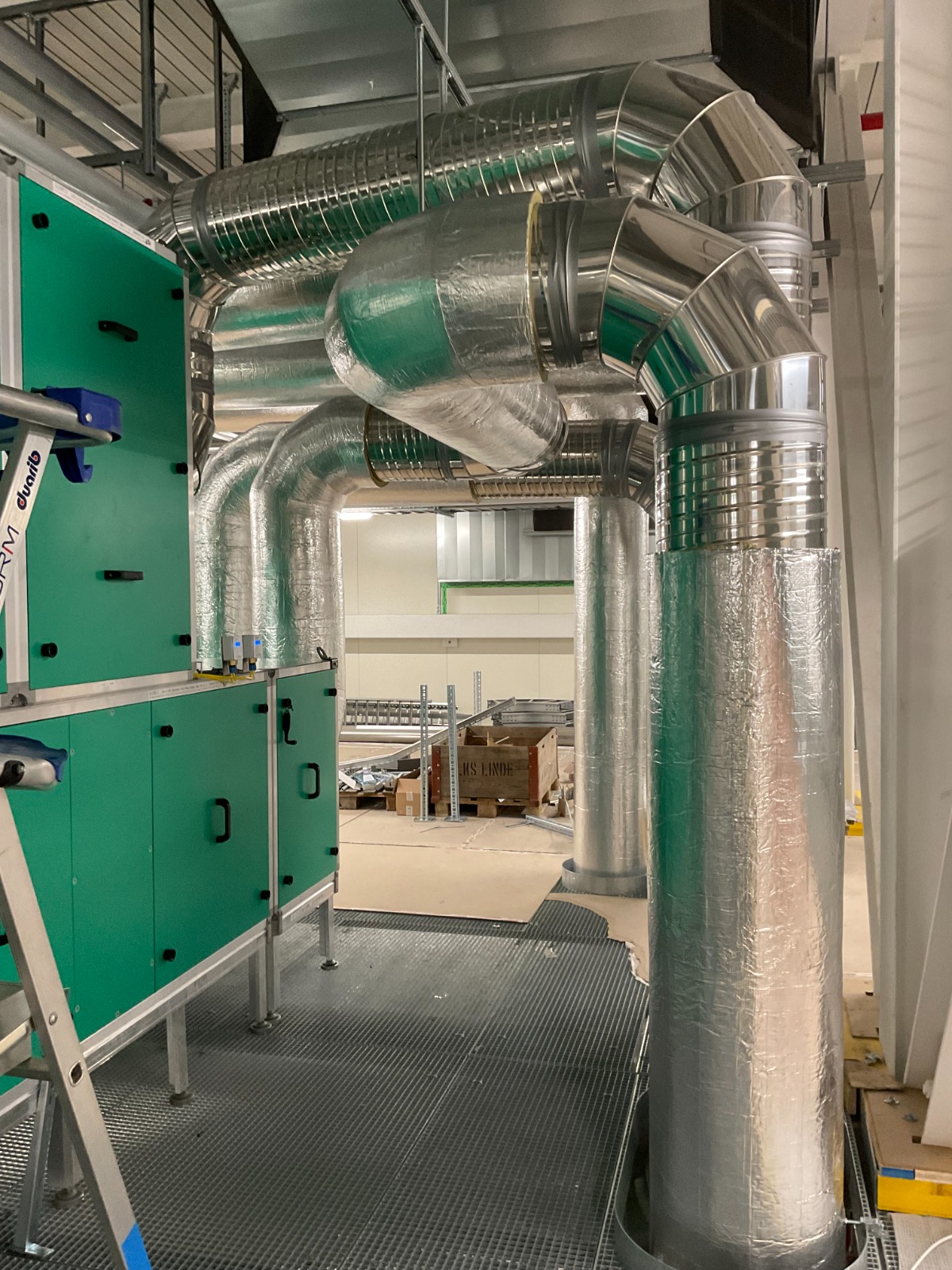 HVAC installation — ductwork and piping networks