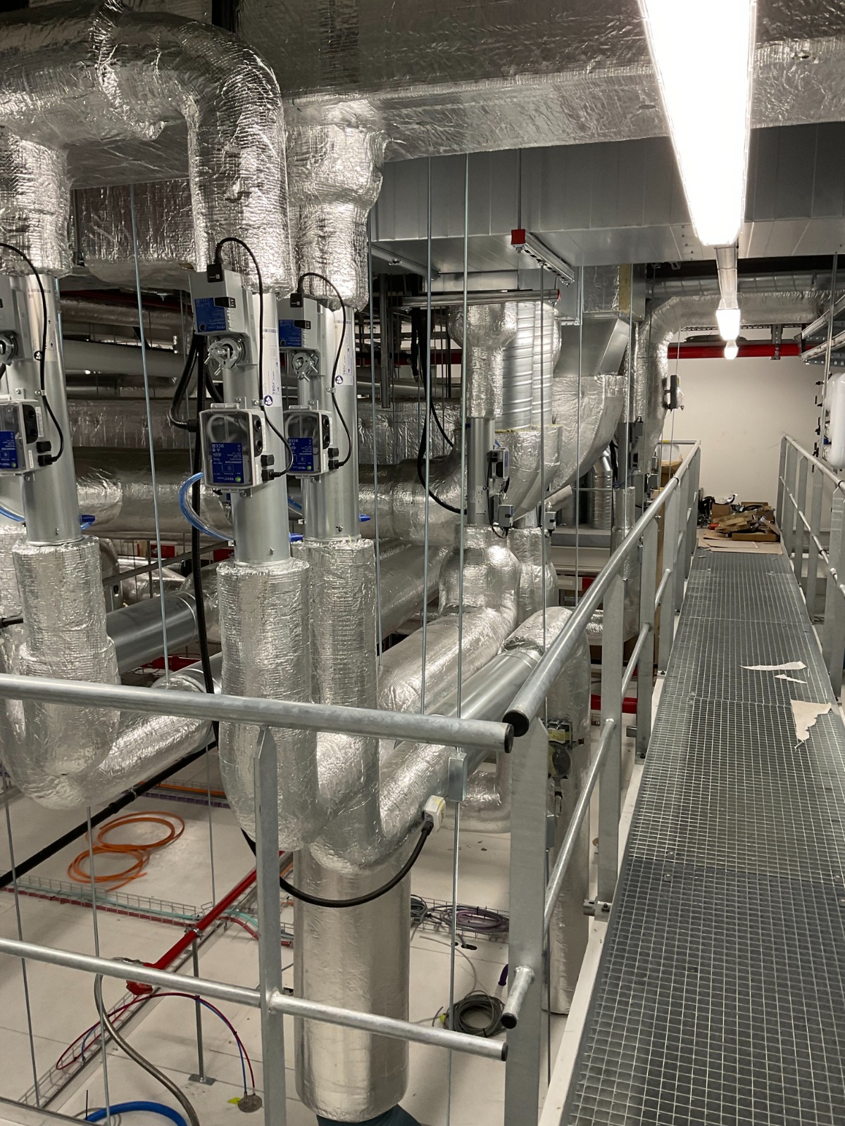 HVAC installation — ductwork and piping networks