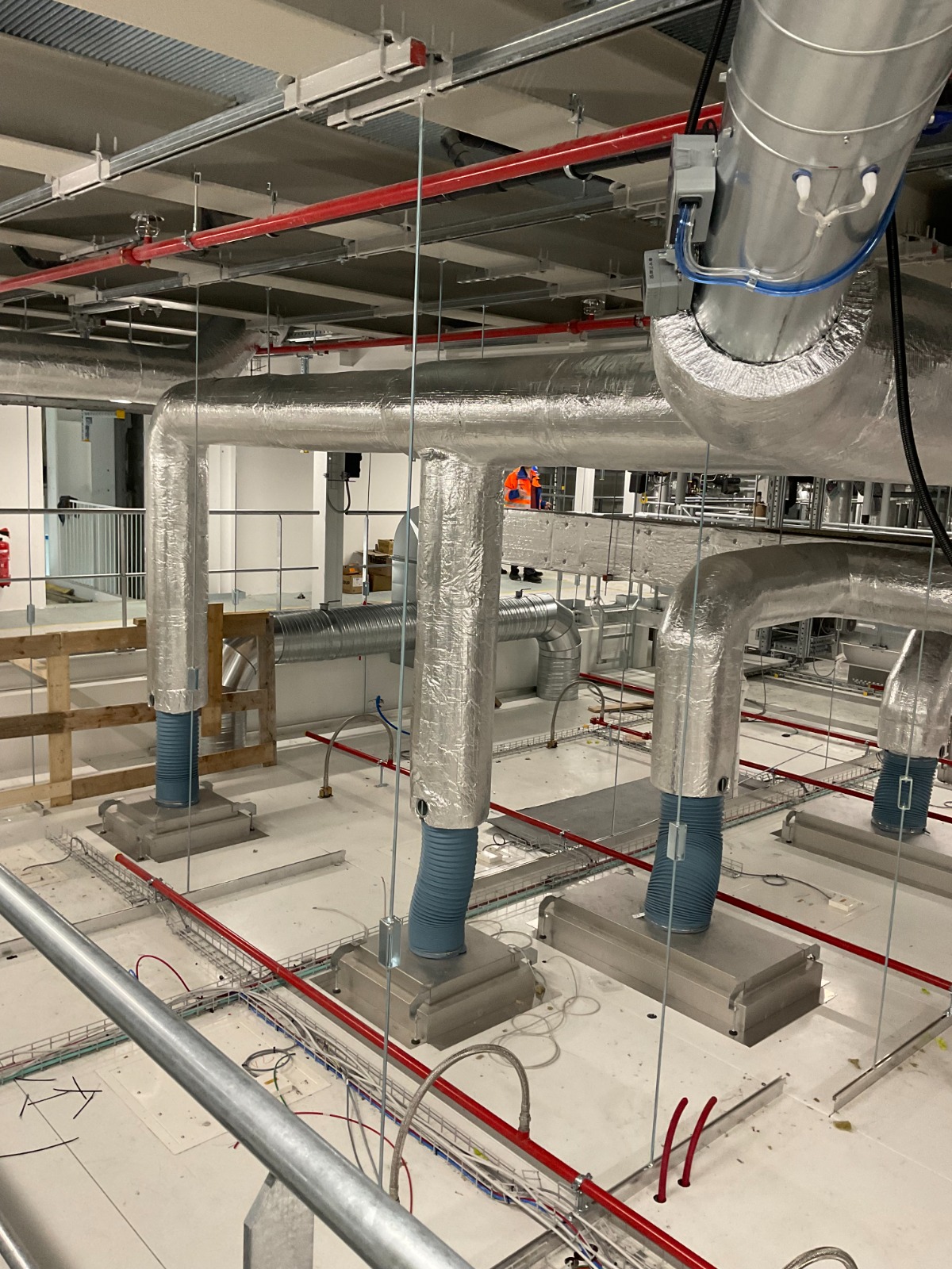 HVAC installation — ductwork and piping networks