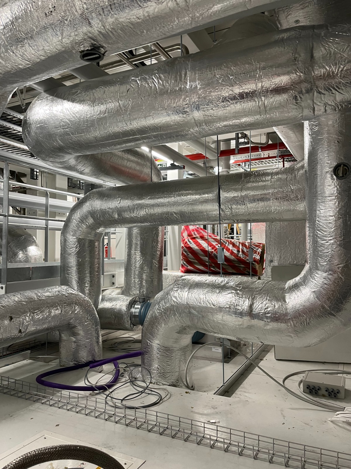 HVAC installation — ductwork and piping networks