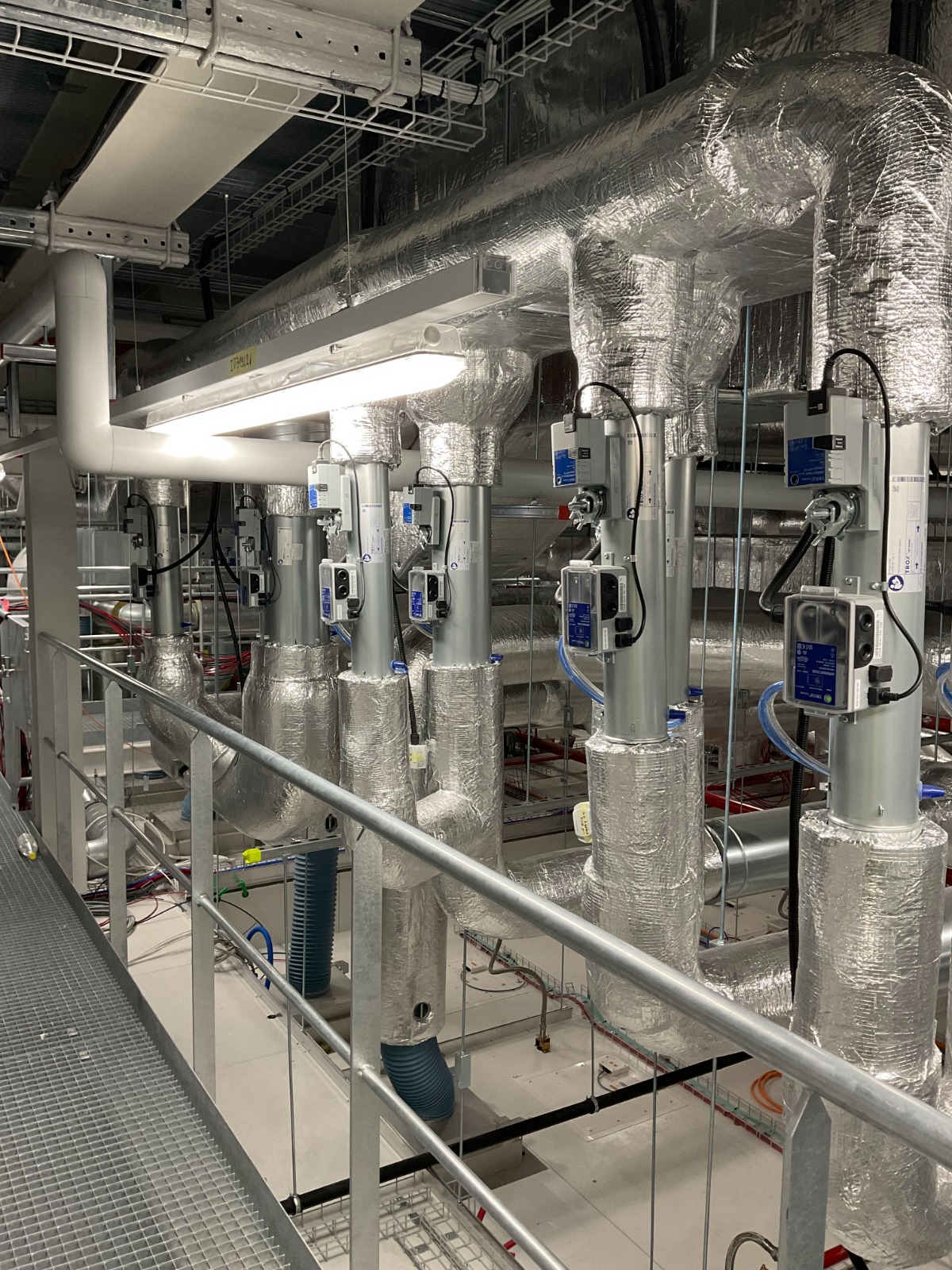 HVAC installation — ductwork and piping networks